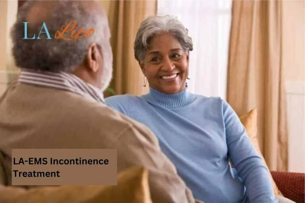 Couple sat smiling at each other - LA-EMS treatment St Albans