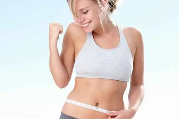 woman happy after fat reduction treatment St Albans