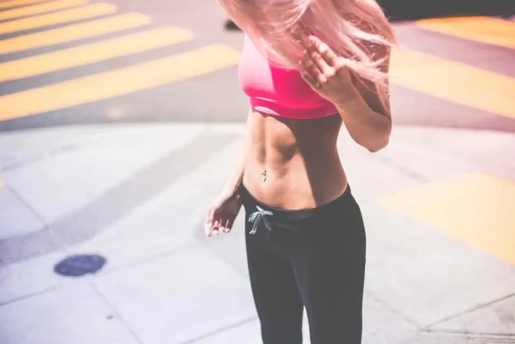 Woman with toned stomach after LA-EMS Body Sculpting Treatment St Albans
